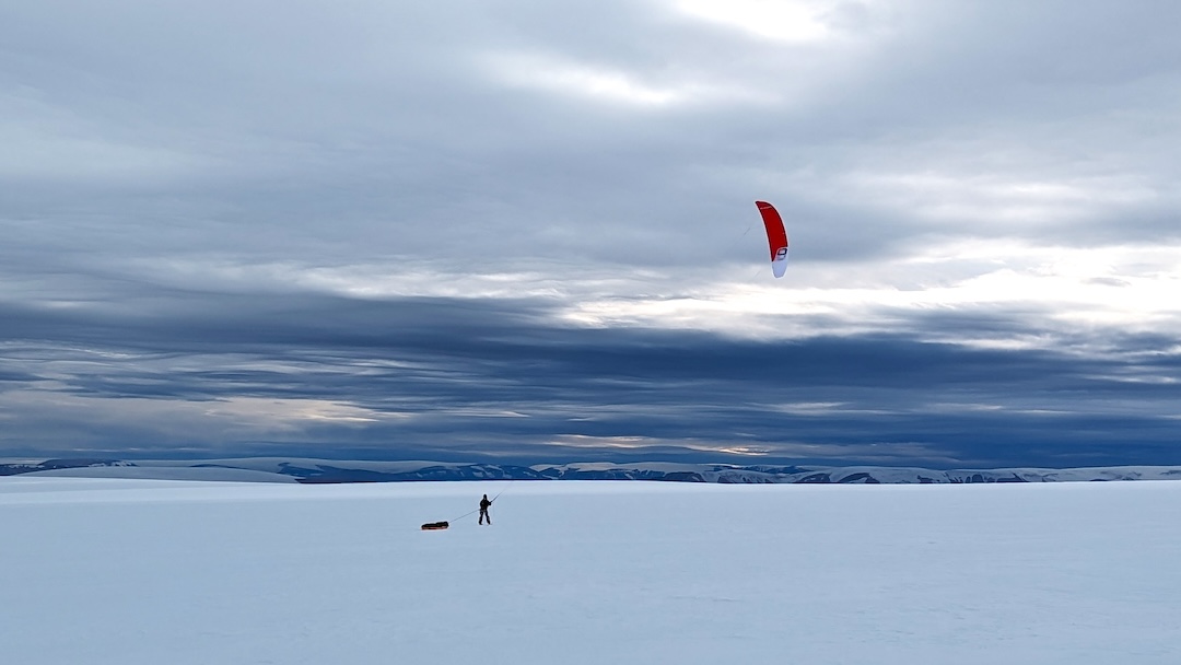 The last day of kiting on the expedition, approaching Qaanaaq on Greenland’s northwest coast.