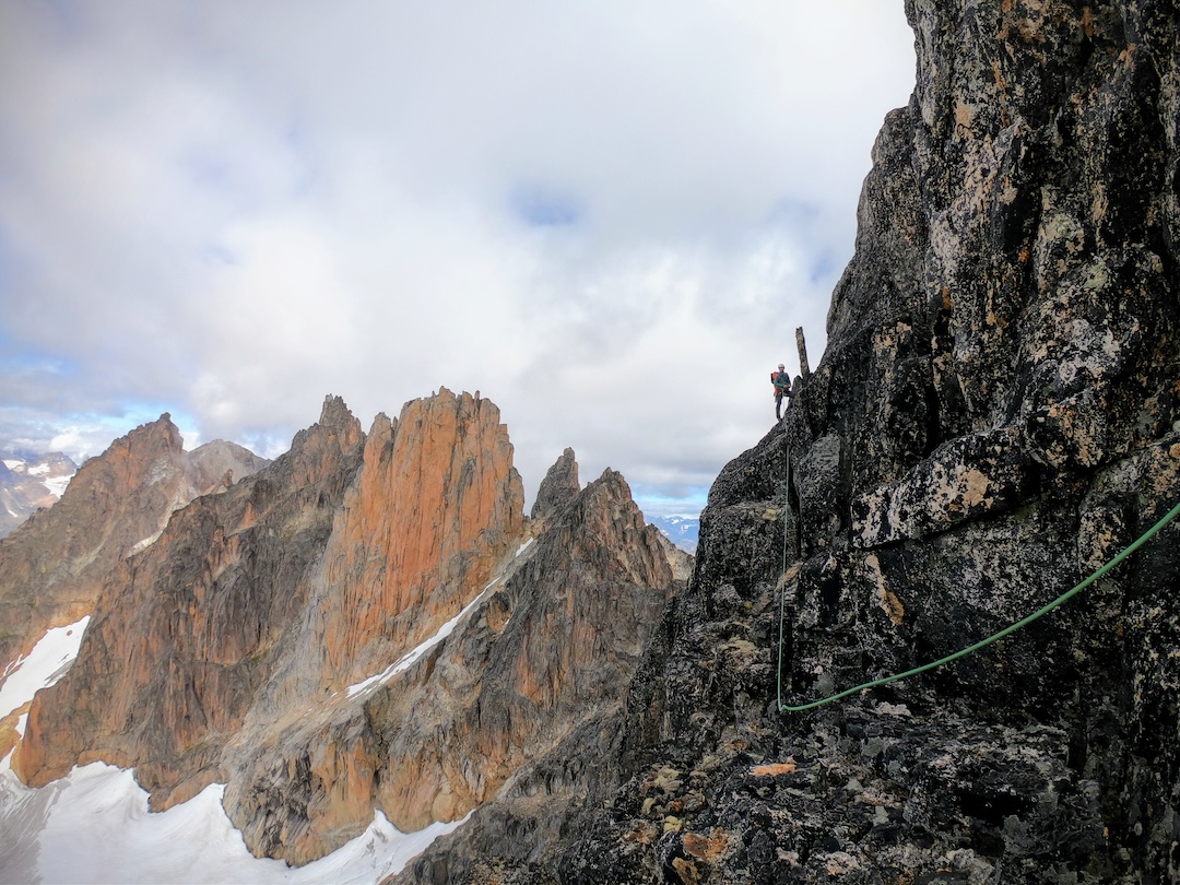 During the all-day approach to Spire of the Northern Fire, the orange wall in back, site of three new routes. 
