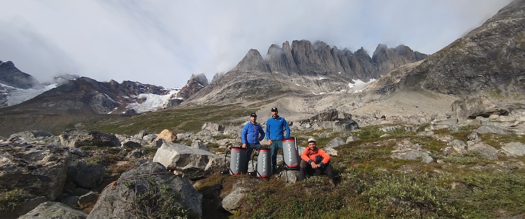 From left to right: Thomas Triboli, Daniele Bonzi, and Francesco Fumagalli at base camp under the walls of Fox Jaw Cirque, Schweizerland, East Greenland.