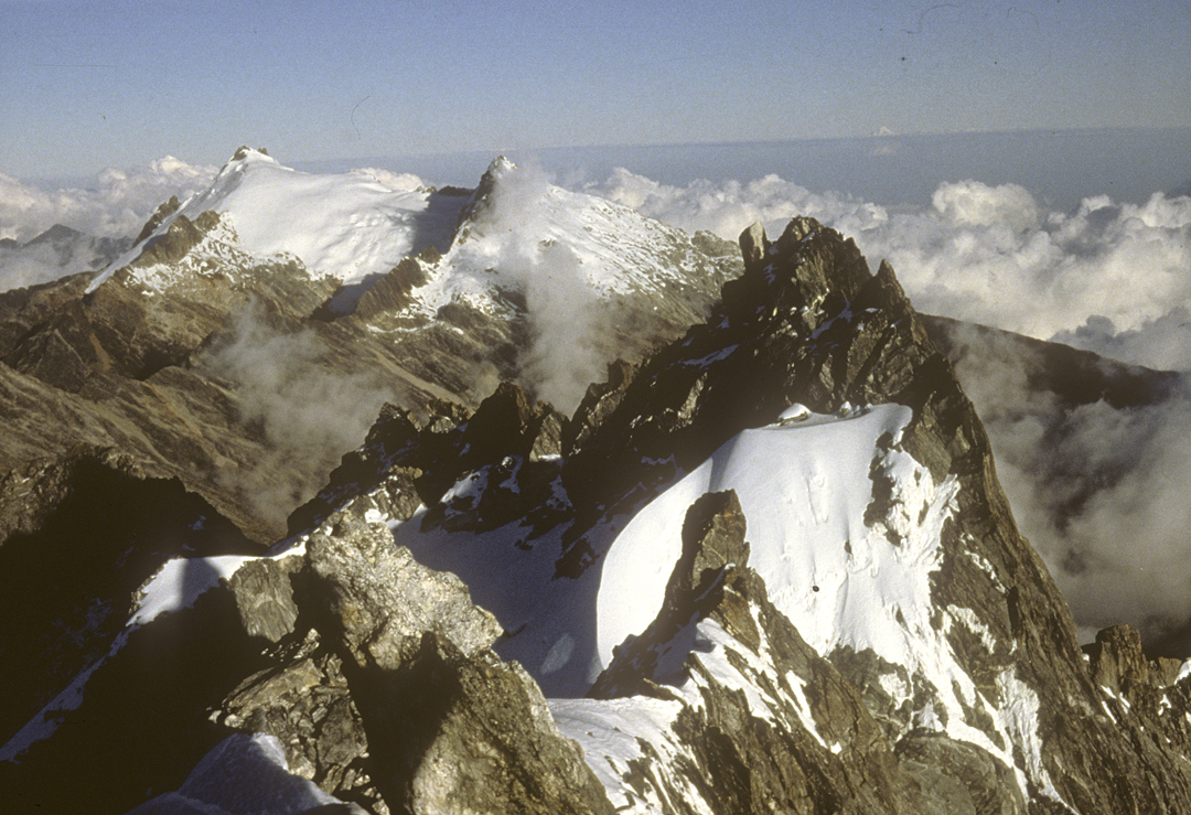 Looking east-northeast from Pico Bolívar on Christmas weekend of 1985 at the extensively glaciated Humboldt (left) and Bonpland. The glaciers are now gone. 
