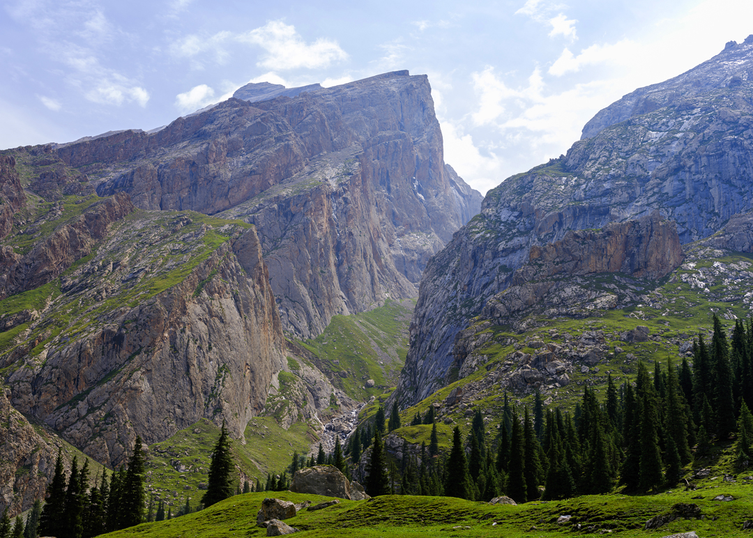 Unclimbed rock walls by Paradise Lake, Xinjiang. The rock is limestone, generally of high quality at lower elevations. 