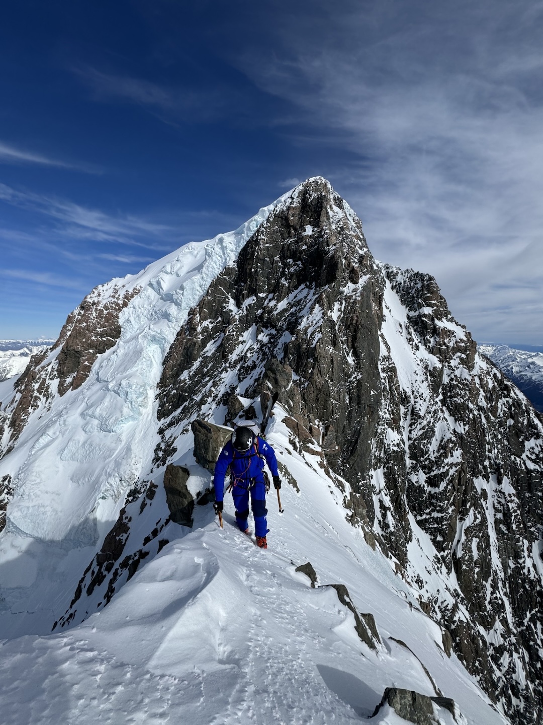 Sam Smoothy on the south ridge of Mt. Dampier, en route to making the first ski descent of the peak via the west face.