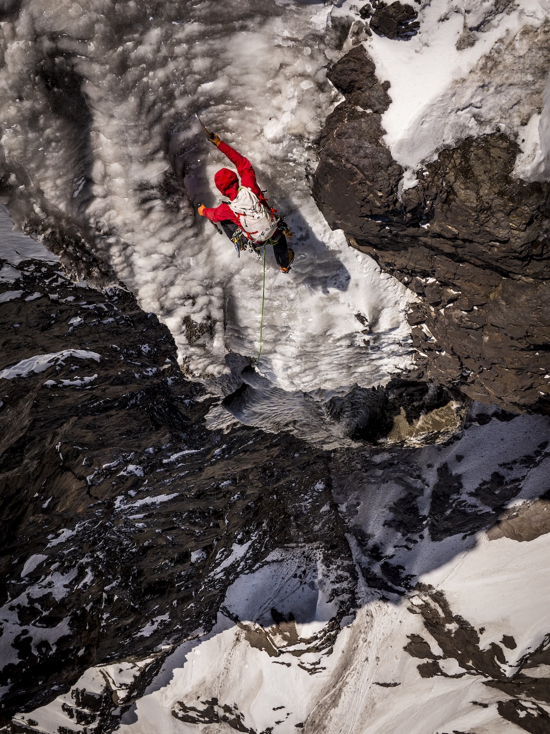 Nicolás Gutiérrez exiting the frozen waterfall on the south face of Cerro Tronco. 

