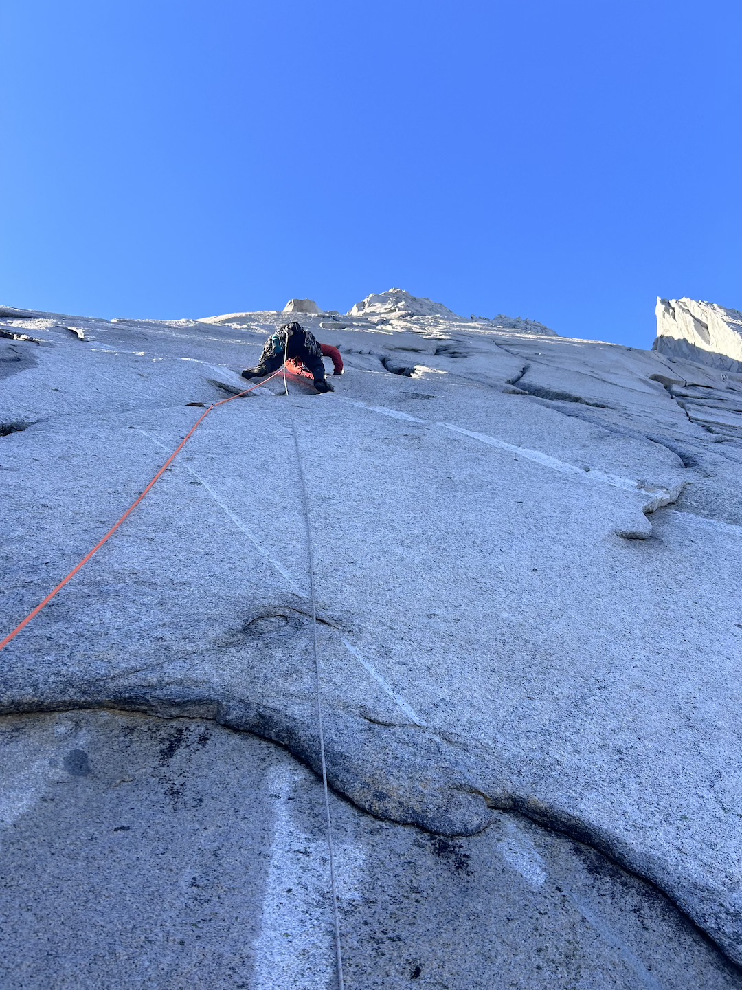 Jasper Pankratz climbing slabs at the start of the headwall on Pirita Central. 
