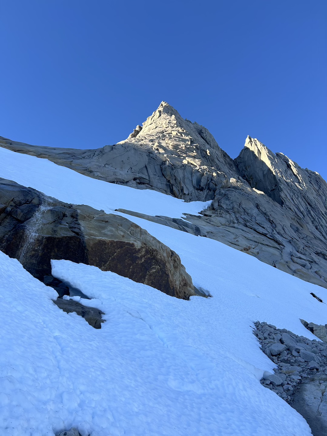 The left side of Pirita Central from the approach slab. Todo lo que se comparte is on the right side of the sunny buttress. 
