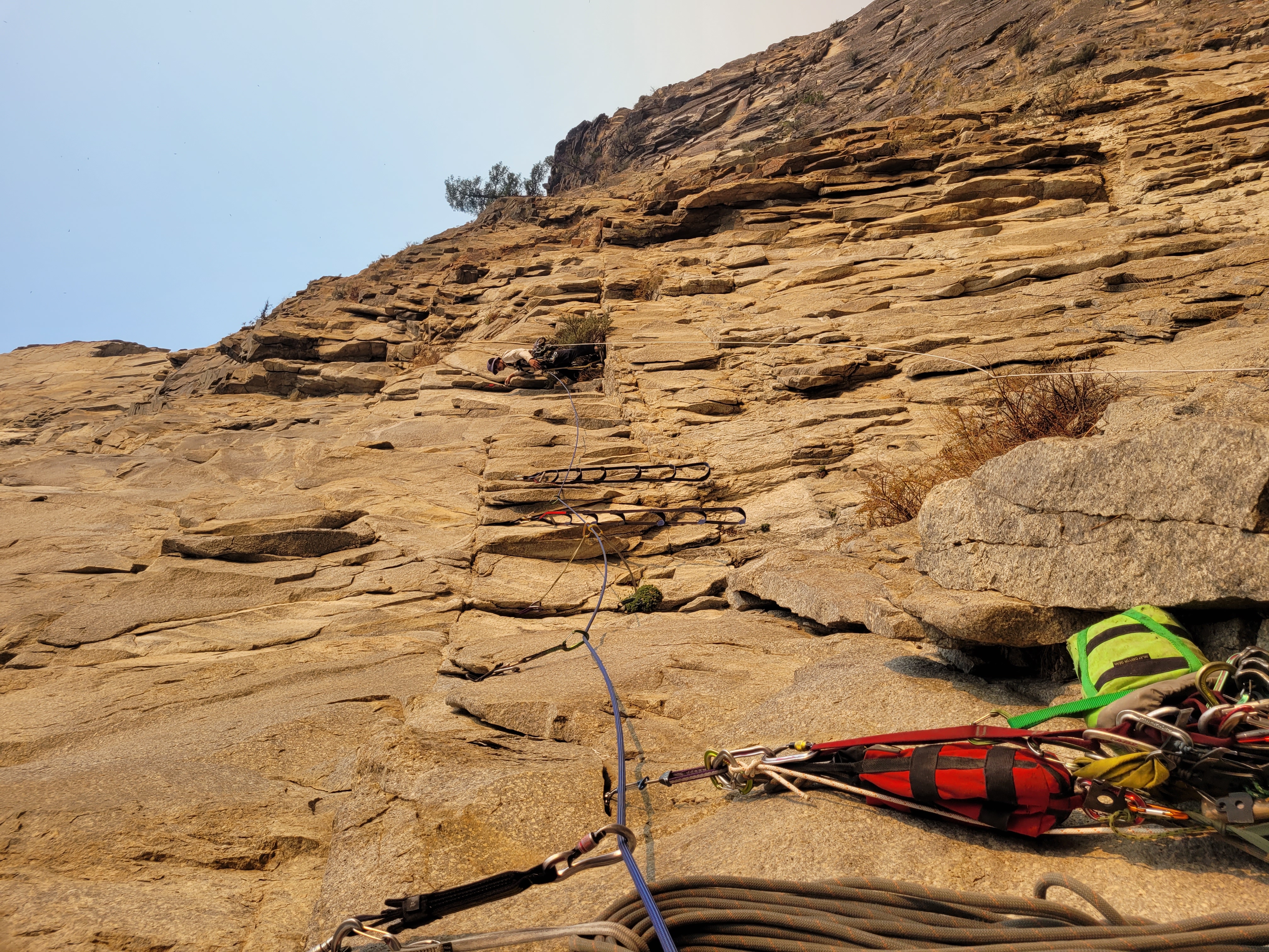 Ky Hart leading a traverse pitch on No Rolling Stone (13 pitches, V5.10 A3) to gain access to the overhanging headwall above. 