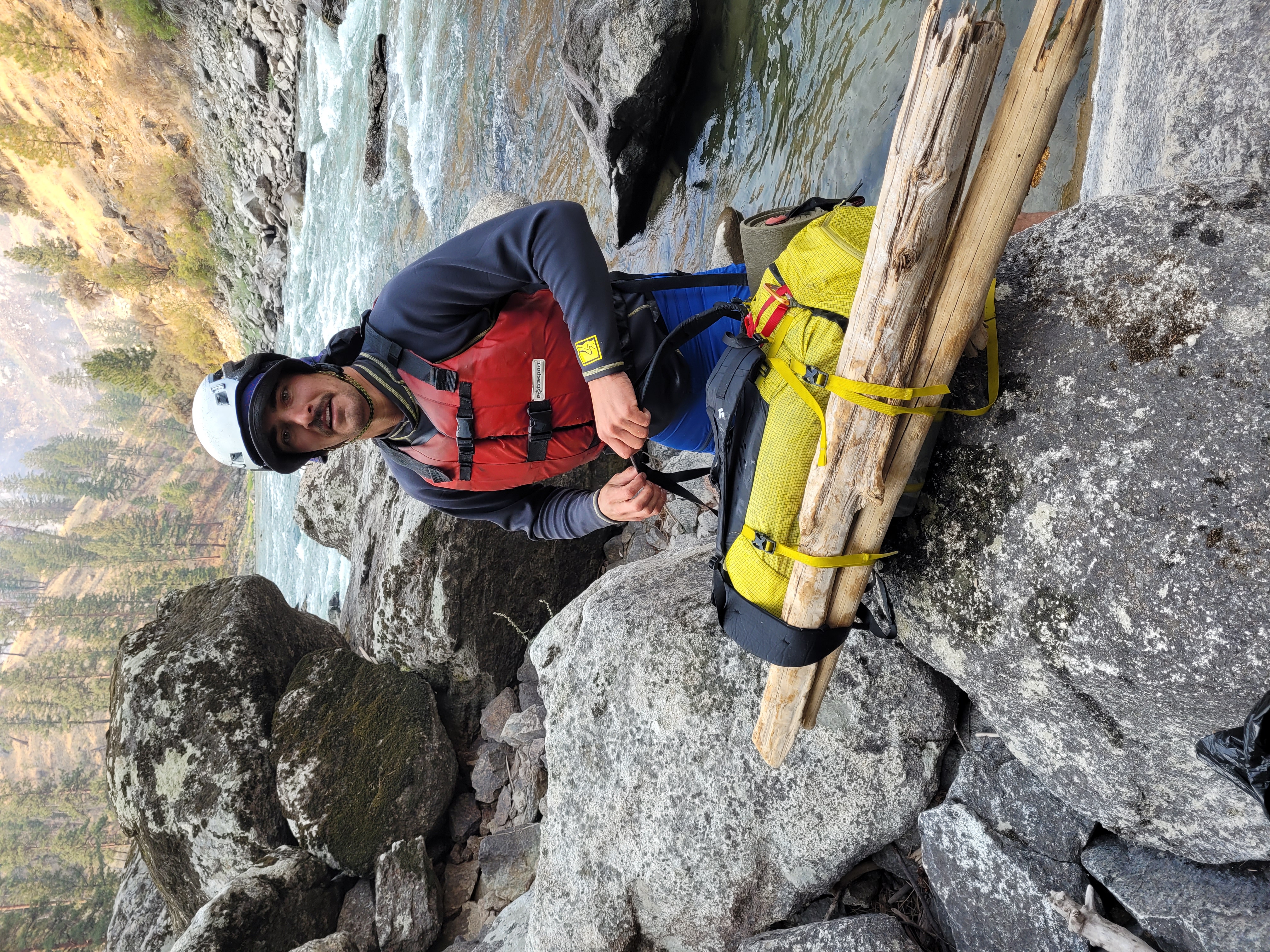 Ky Hart adds some natural flotation to his waterlogged backpack during the three-mile swim down the Middle Fork of the Salmon River. 