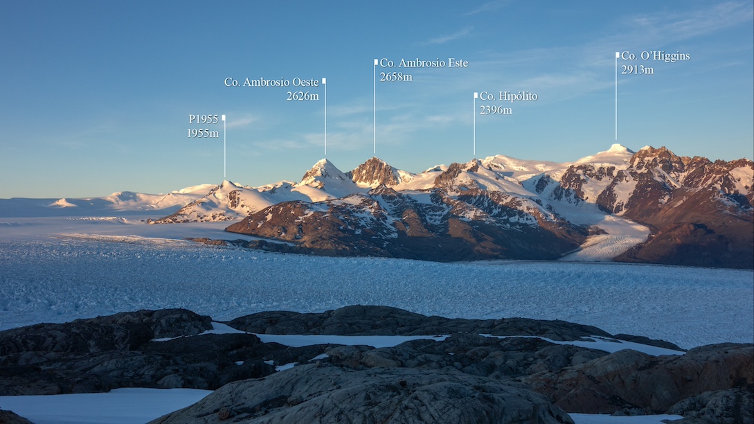 The mountains of the Cerro O’Higgins massif as seen from the DGA hut. The 1960 first ascent of Cerro O'Higgins followed the glacier directly below O’Higgins itself, whereas the 2022 and 2023 expeditions approached from the plateau to the west (left), passing under the summit of Peak 1,955m.