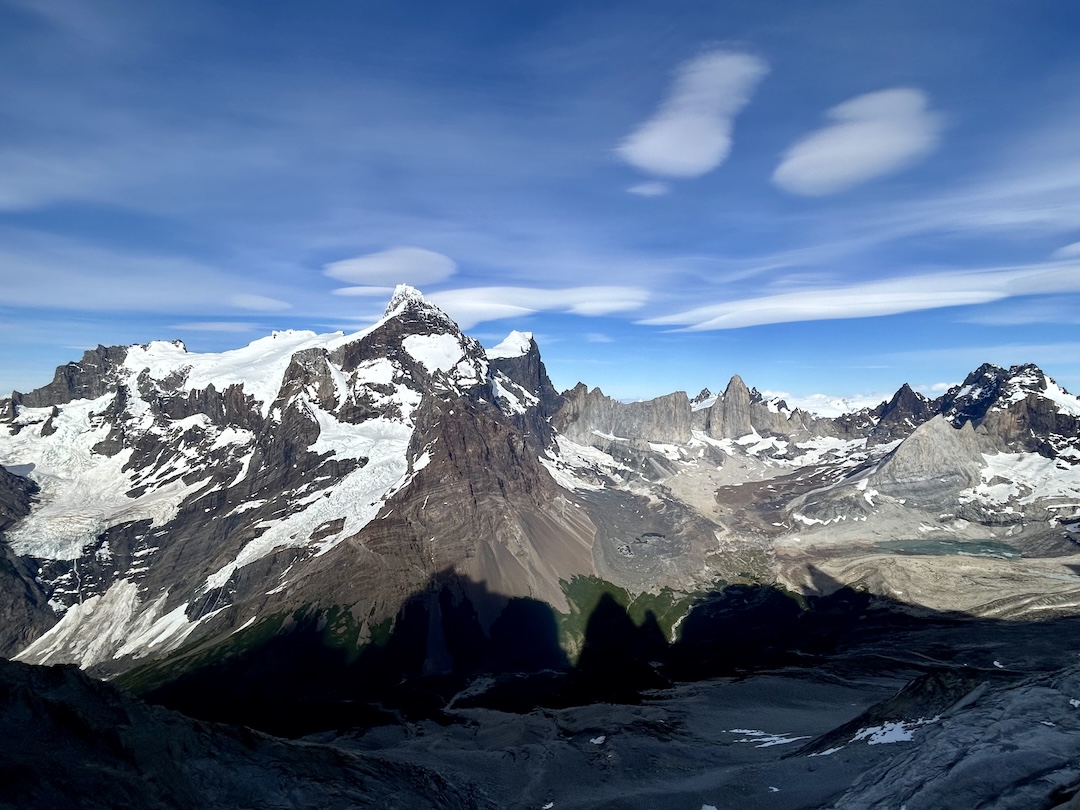 The silhouettes of Cuerno Norte, La Mascara, La Hoja, and La Espada projected west across the French Valley at Sunrise. 