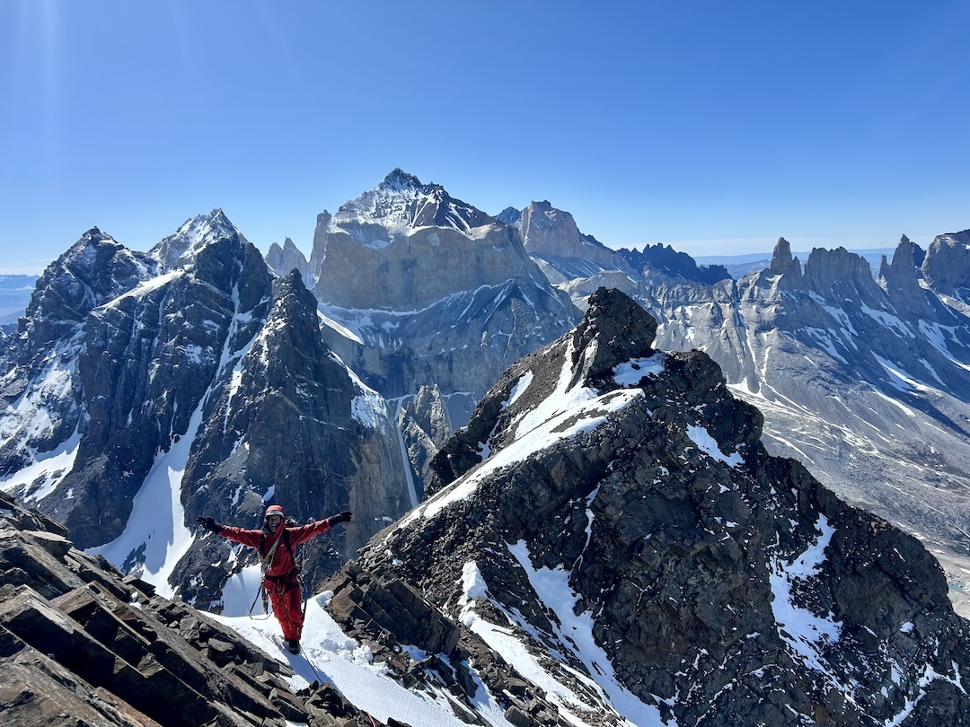 Hernán Rodríguez on the summit ridge of Cerro Trono Blanco with Cerro Escudo and Cerro Fortaleza (left to right) in the background.  