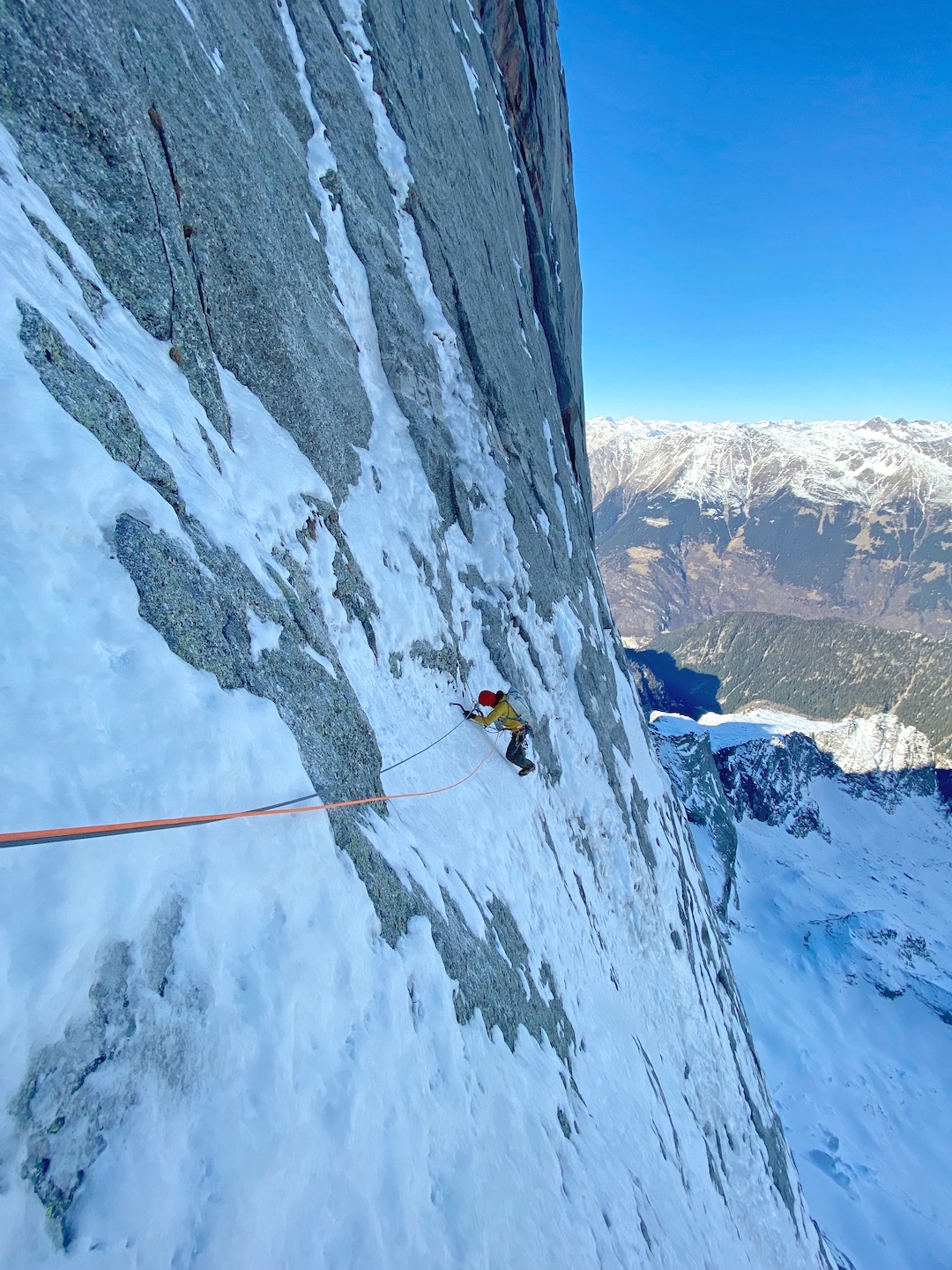 David Hefti following run-out climbing high on the Battaglia-Corti Route during the first winter ascent.