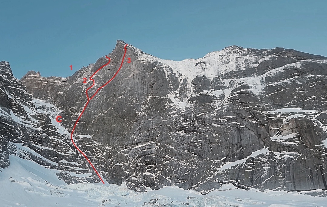 The northeast face of the Piz Badile in winter with (1) the east ridge,  (2) the Battaglia-Corti Route, and (3) the British Route (Isherwood-Kosterlitz) rising out of (C) the northwest couloir of the Colle del Cengalo.