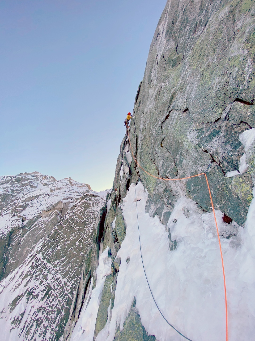 David Hefti on pitch four of the Battaglia-Corti Route on the Badile—the start of the rising leftward traverse from the Isherwood-Kosterlitz route.