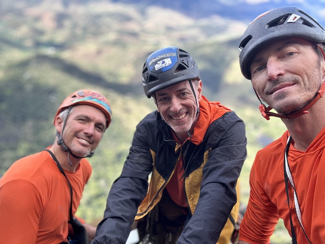 Ed Pailha (left), Valdesir Machado (center), and Willian Lacerda (right) on the summit of Pedra da Lajinha, after establishing a new route O Trem da Minha Vida (830m, 7a). 