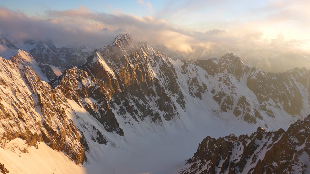 Seen from Korona Peak, across the Ak-sai Glacier: the north face of Svobodnaya Korea (4,778m), with Ak-too Peak on the right and a shoulder of Simagina on the left. 