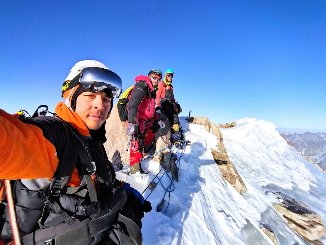 Self-portrait of the team on the summit of Semenova-Tyan-Shanskogo Peak.