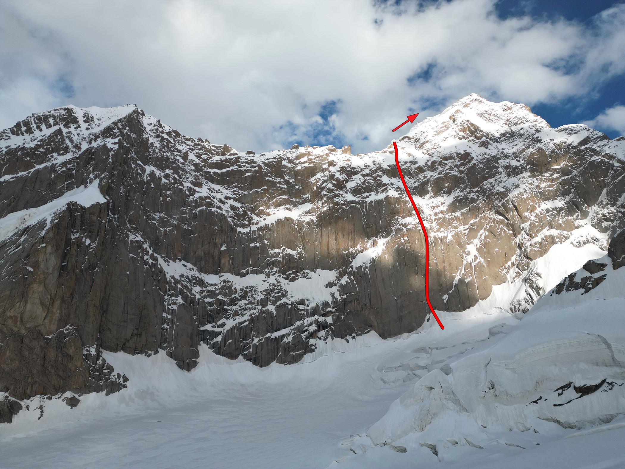 The six-kilometer-wide northwest wall of Kyzyl Asker North (left) and Kyzyl Asker (summits not visible). The approximate line of the 1985 Kazakh route is shown; the team continued to Kyzyl Asker’s summit for the first ascent of the peak.