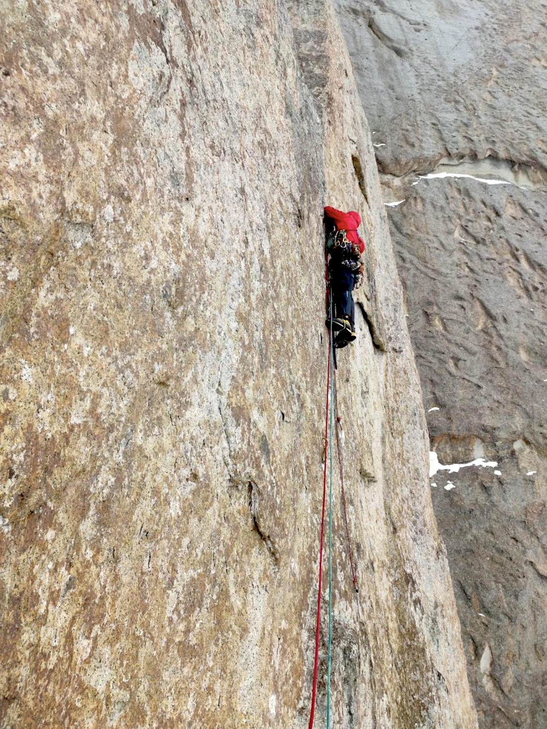Complex aid low on the 2022 route up the northwest face of Verniy Peak.