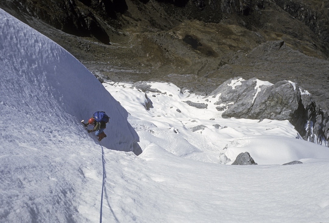 Jan Solov on the lower part of the west-northwest rib of Pico Bolívar. Below is the upper Espejo Valley. 
