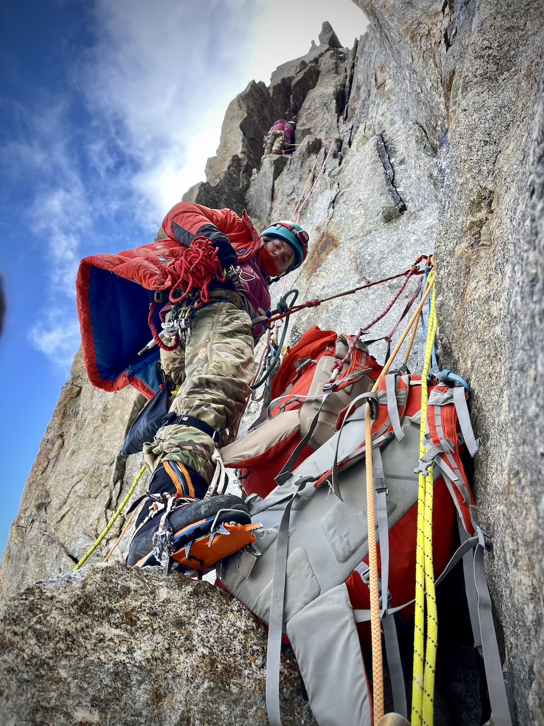 Darya Serupova, day three on Argo. The climbers' camo trousers are not military—they are just cheap!