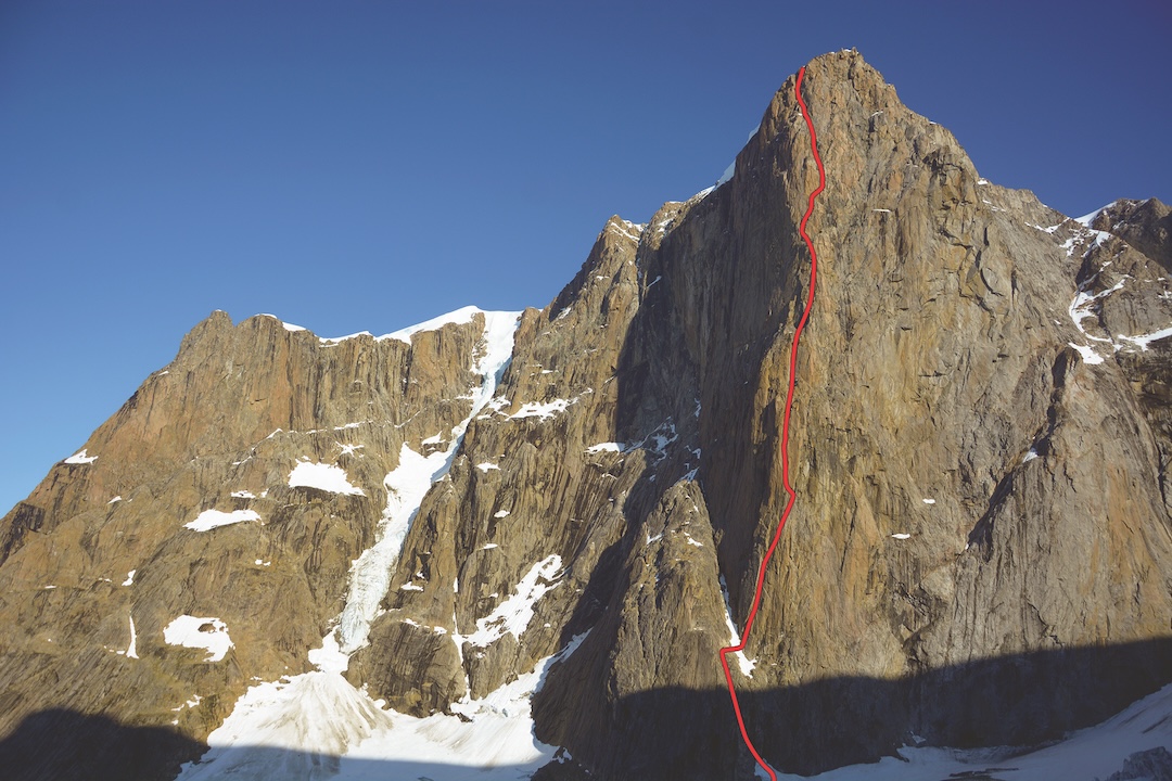The Drøneren massif, rising nearly 1,900 meters above the nearby fjord, showing the 1,200-meter line of Odyssea Borealis. A team led by Mike Libecki started up the shadowed face on the left in 2017 but switched to Plan B Tower, farther to the left. 