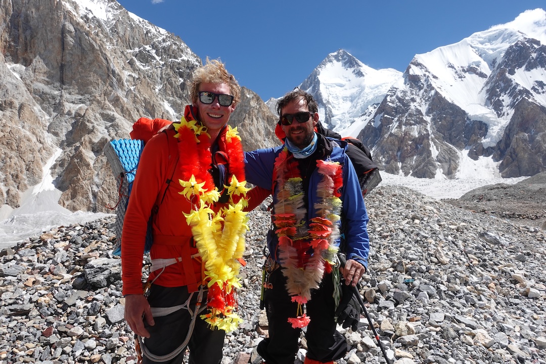 Tom Livingstone (left) and Aleš Česen back at base camp after completing the west ridge of Gasherbrum III.