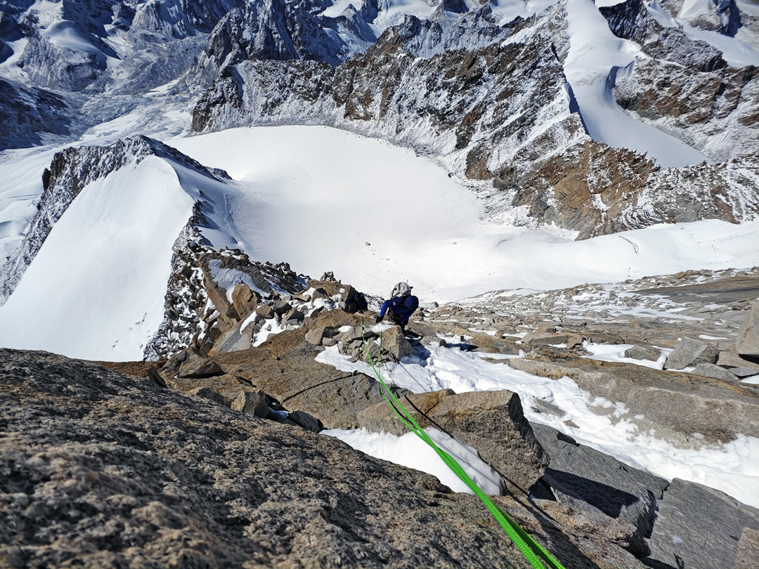 Mixed climbing on the southwest ridge of Sir Duk. The approach glacier is directly below the climber. 