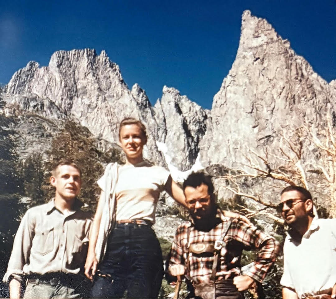 Virginia and Stanley Boucher, who met through climbing at Colorado College, stand in the center with friends, below the Minarets in the Sierra Nevada.