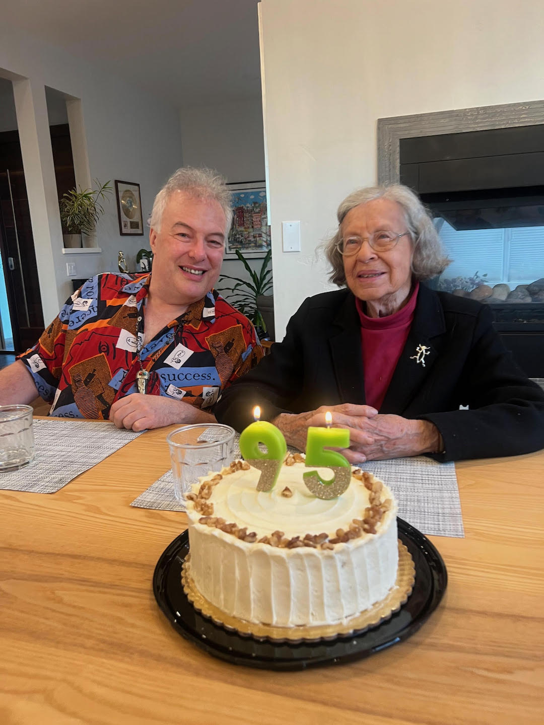 A smiling Virginia Boucher on her 95th with her son, Eric Boucher, professionally known as Jello Biafra, an artist and activist. He is the former lead vocalist for the seminal punk-rock band Dead Kennedys.