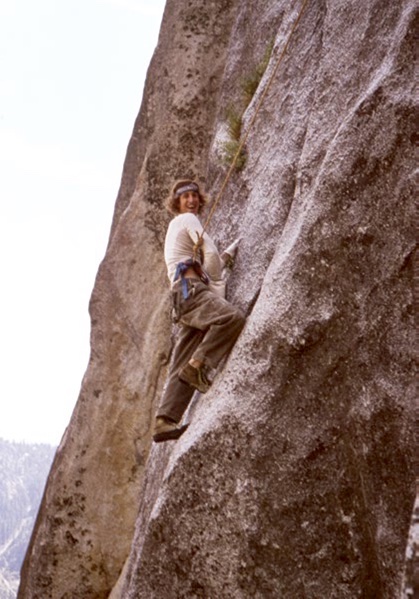 Dale Bard leads down and sideways on Wild Thing (5.10c and hard for the grade), which goes to the summit of the Folly formation, behind Camp 4 in Yosemite, circa 1975.