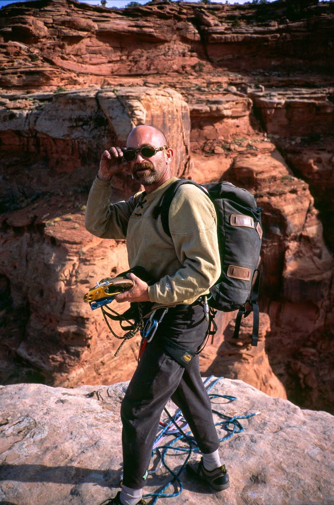 Ron Olevsky repeating the Witch, Hell Roaring Canyon, Utah. He soloed (on aid) the first ascent of this 300-foot tower on Halloween, 1984.