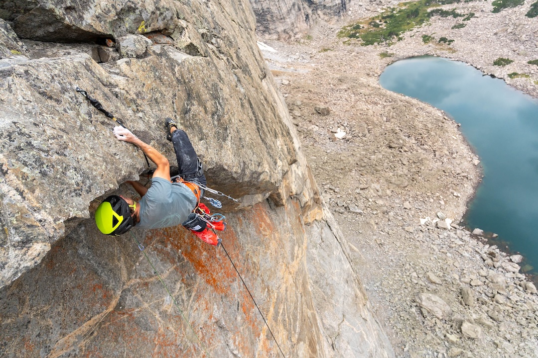Wilson Cutbirth muscles over a crux roof on The Living Stone, Mt. Hooker.