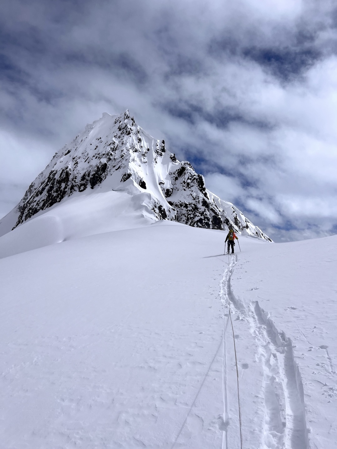Eli Sturm approaching Point 8,350’. The team would bail one pitch up, after realizing there would be no safe way to rappel back down. 
