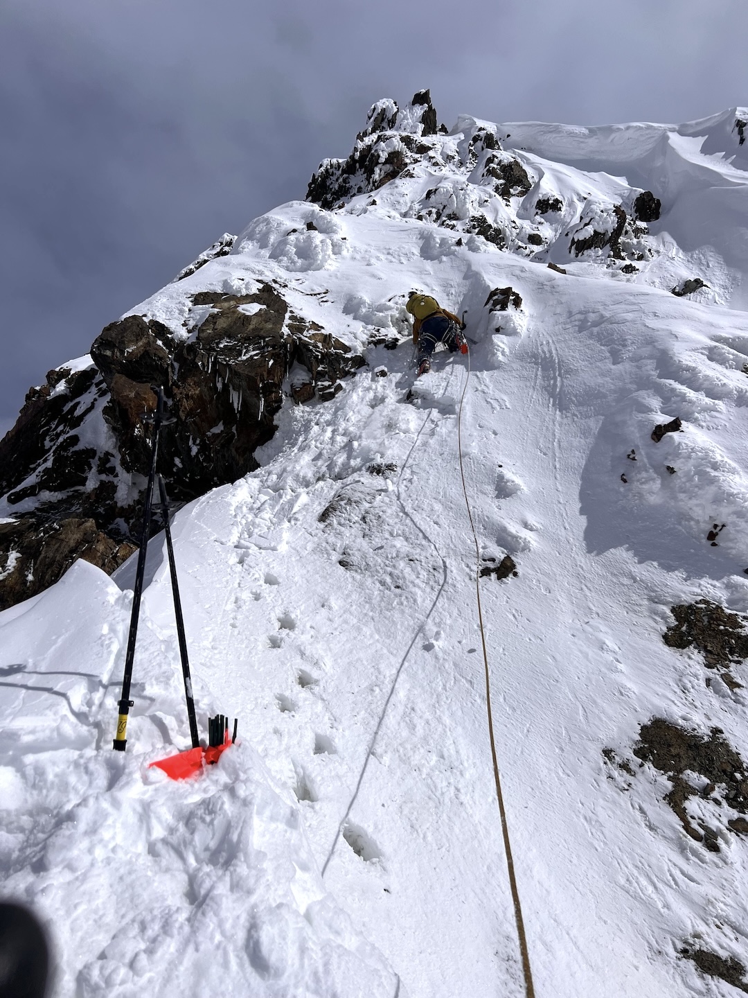 Eli Sturm leading the first and only pitch the team would climb on Point 8,350’ before bailing. 