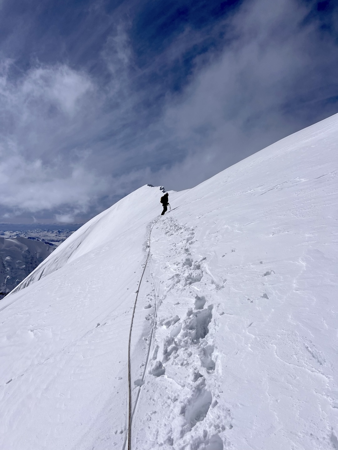 Eli Sturm on the summit ridge of the Batwing (Peak 9,020’), after climbing the southeast face. 