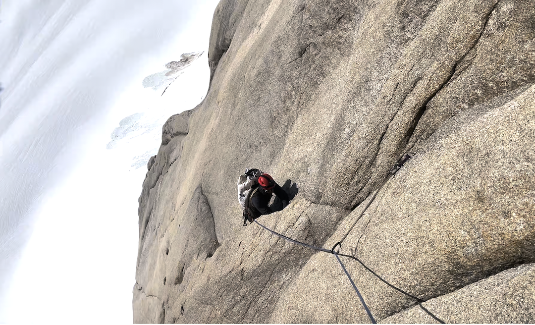 Vincent Lapointe on the upper slabs of Babies' First Big Wall, a new big-wall route on the east buttress of the Citadel in the Kichatna Mountains. 