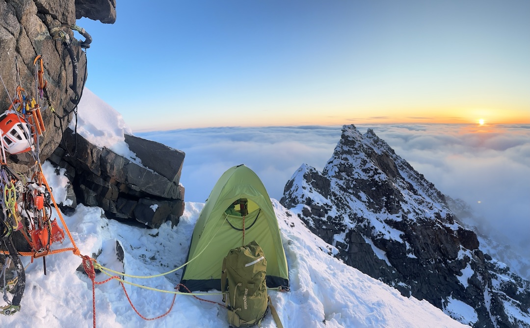 Sunrise from the second bivy on the Enthalpy Ridge (northeast ridge) of Mt. Moffit, with the crux rock towers behind. 