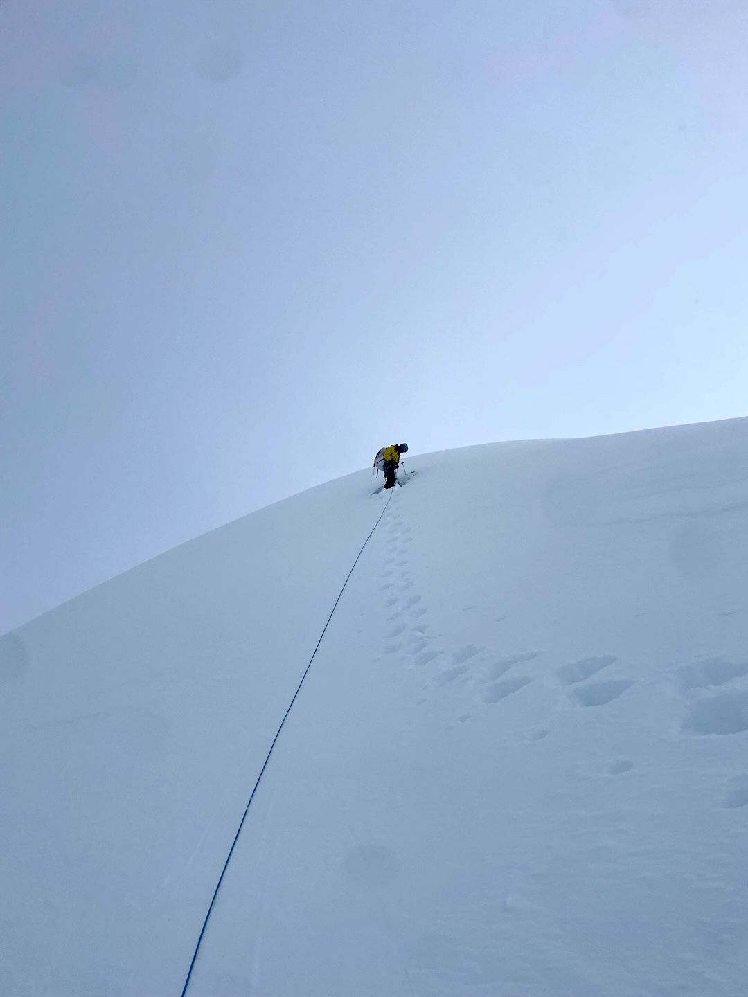 Simeon Ramirez reaches the summit of Castle Mountain (7,333’) after making the first ascent of the north face (1,100’, 50°–55°). The 2025 team was the second party to climb the mountain, after an ascent in 1970 from the Shakes Glacier (see AAJ 1971). 