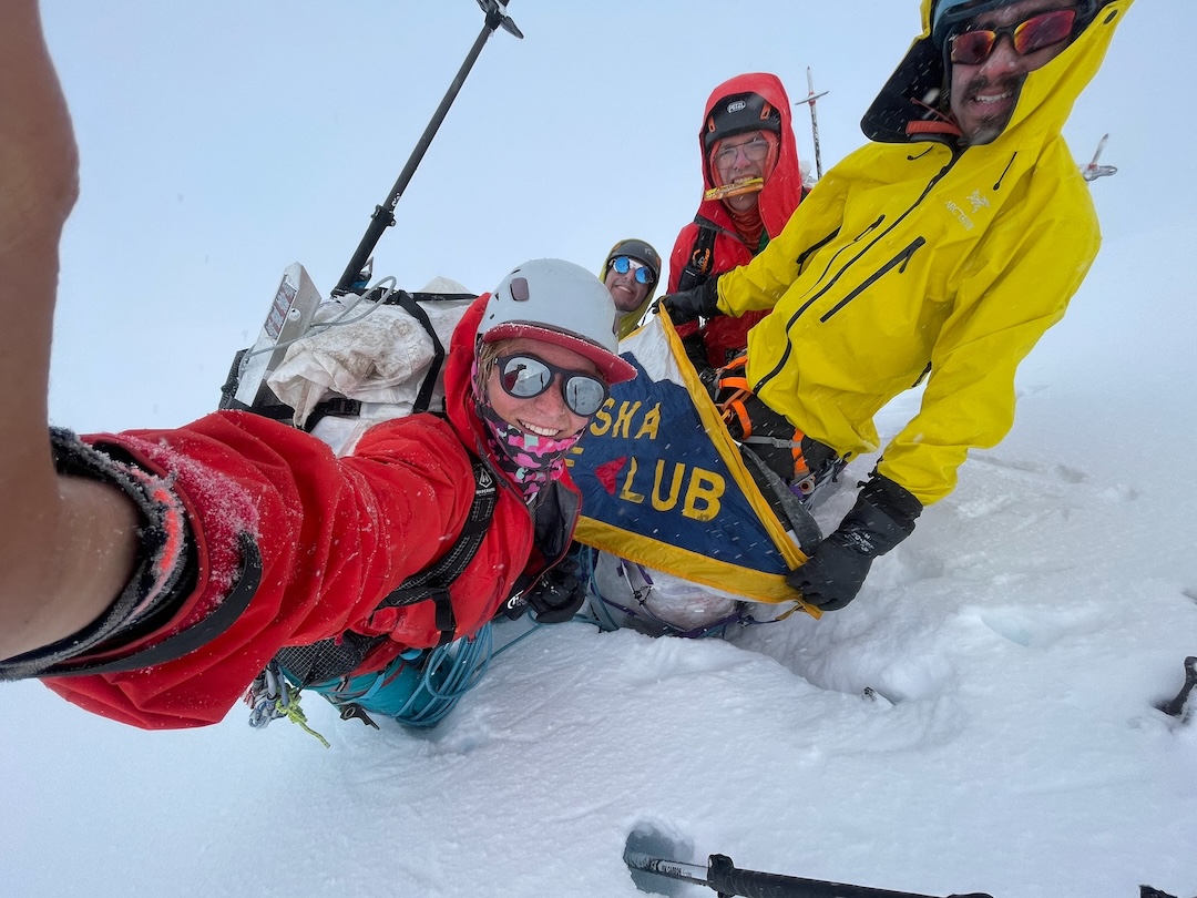 Team selfie on the summit of Castle Mountain (7,333’) after establishing a new route, the north face (1,100’, 50°–55°), in a whiteout. This was the second ascent of the mountain, which had not been climbed since its first ascent in 1971. From left to right: Hazel Probst, Leo Nordman, Torin Hooge, and Simeon Ramirez.