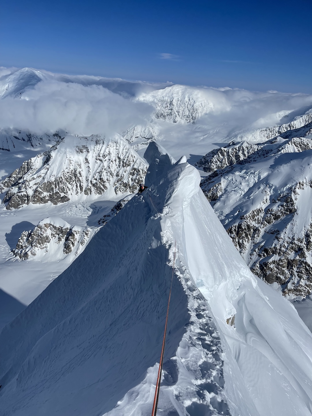 Vincent Landry follows a pitch along a corniced ridge en route to the summit of Begguya, after climbing Deprivation on the North Buttress. Miller would later solo up and back down this feature. 