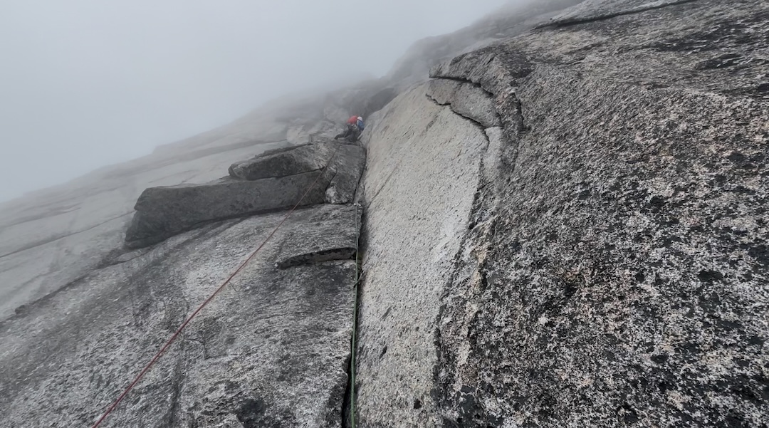 Matt Kligerman leading up the “Isabella-Luke Wall” in dense clouds. 