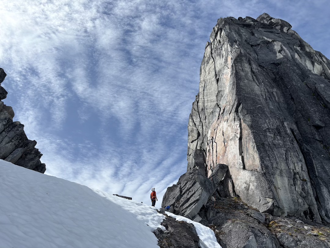 Matt Kligerman admires the rock wall leading out of the initial gap in the east ridge of the Trickster. Four pitches brought the climbers to moderate terrain along the crest of the ridge. 
