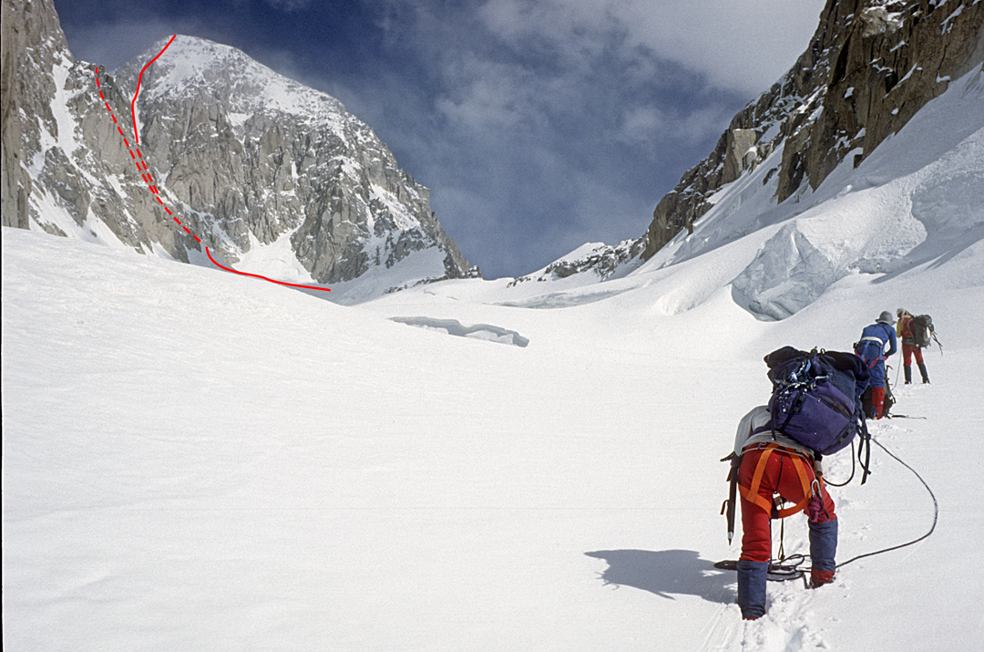 The west face of Tirich Mir above the head of the Upper Tirich Glacier. The left dashed line is the couloir followed on the normal route (1967), entirely hidden in this photo. The right-hand line is the approximate route followed in 2025.  