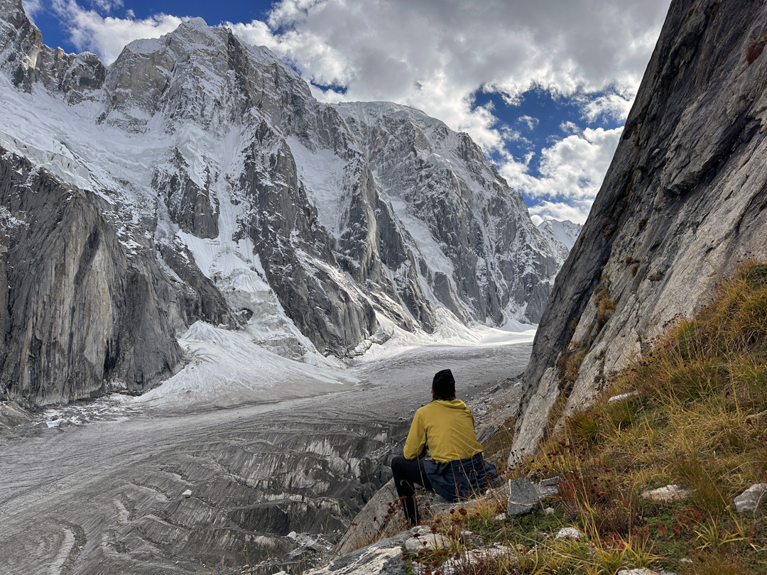 The north face of Dansam in the western Saltoro Mountains. The main summit, left of center, is unclimbed. The west summit, which appears as a quasi-horizontal shoulder to the right, has received two ascents. In 2021, a Franco-Spanish team made the second ascent via the steep buttress on the far right of the face.  