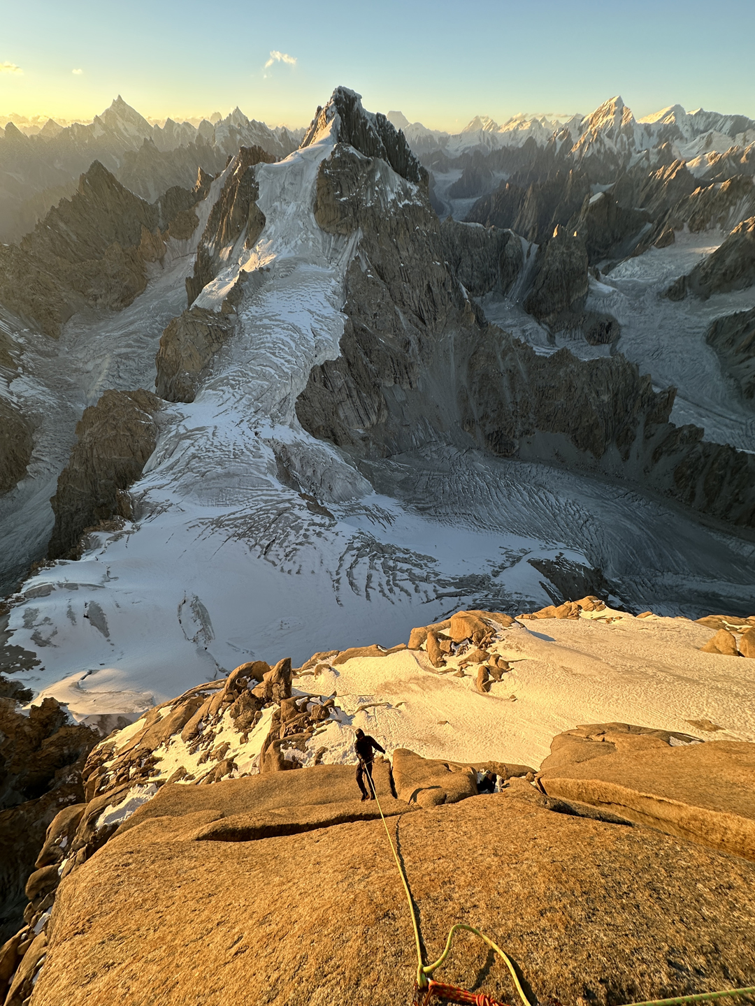 Looking northwest from near the summit of Sangar Tower at unnamed Peak 6,210m. This summit was first climbed in 2021 via the broad snowy ridge facing the camera by Eivind Hugaas, Juho Knuuttila, and Nelson Neirinck (AAJ 2022). 