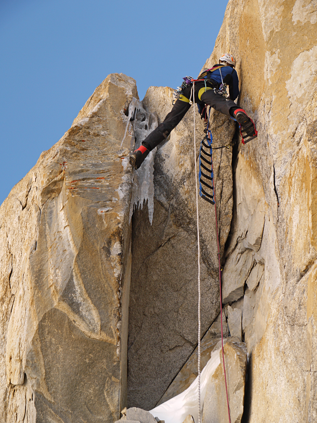 Florian Jehle on the last steep aid pitch before reaching the upper snowy terrain of Sujo on the southeast face of Hunza Peak. 