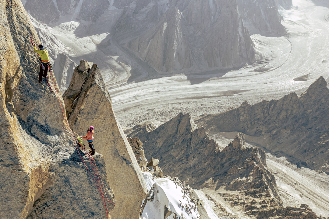Jon Griffin and Thomas Huber near the top of Eye Ri during the first ascent via the west ridge. Choktoi Glacier below.