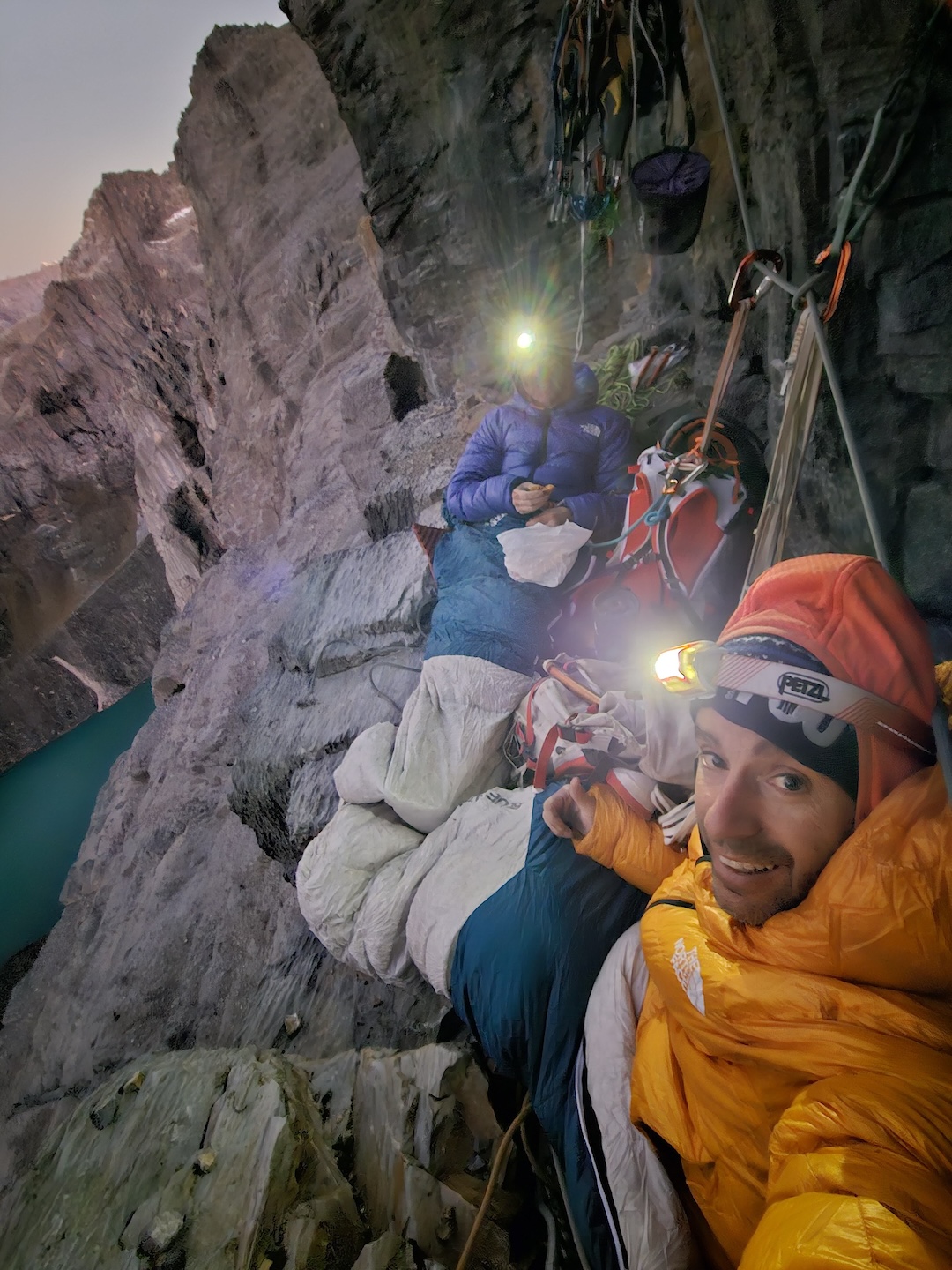 Brothers Eneko and Iker Pou at their first bivouac, after climbing the first half of the wall. 