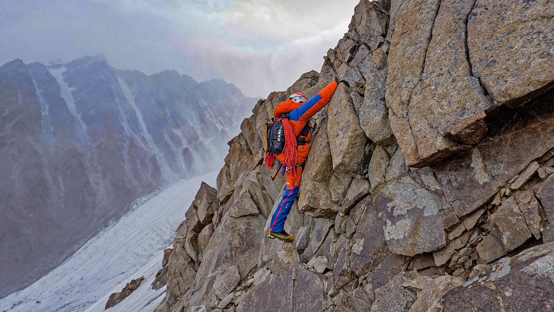 Lukas Woerle climbing loose ground on the lower section of the west ridge of Cherireen Sar. 