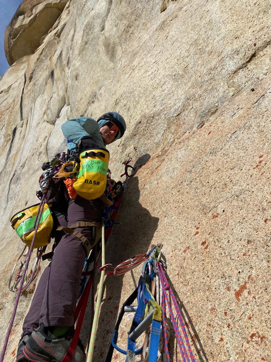 Marshall Trautman hooking above the anchors at the start of pitch three (A3) of Mother of Exiles. 